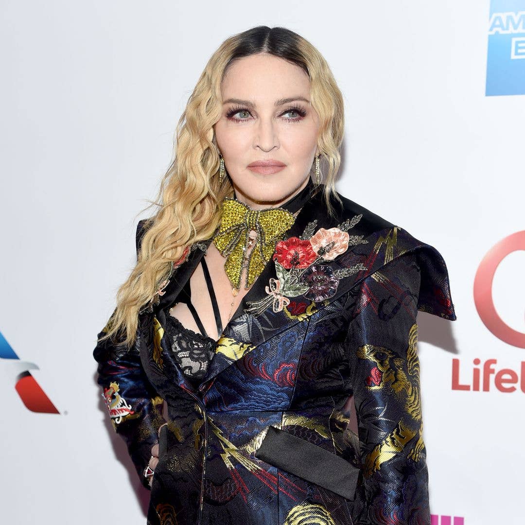 Madonna looks ageless in surprise appearance to support twin daughters